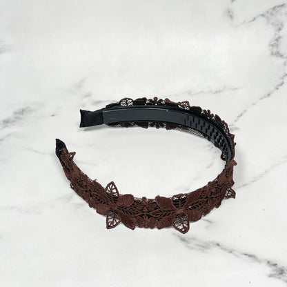 Medium broad colored hair bands with brown lace floral design on black plastic base