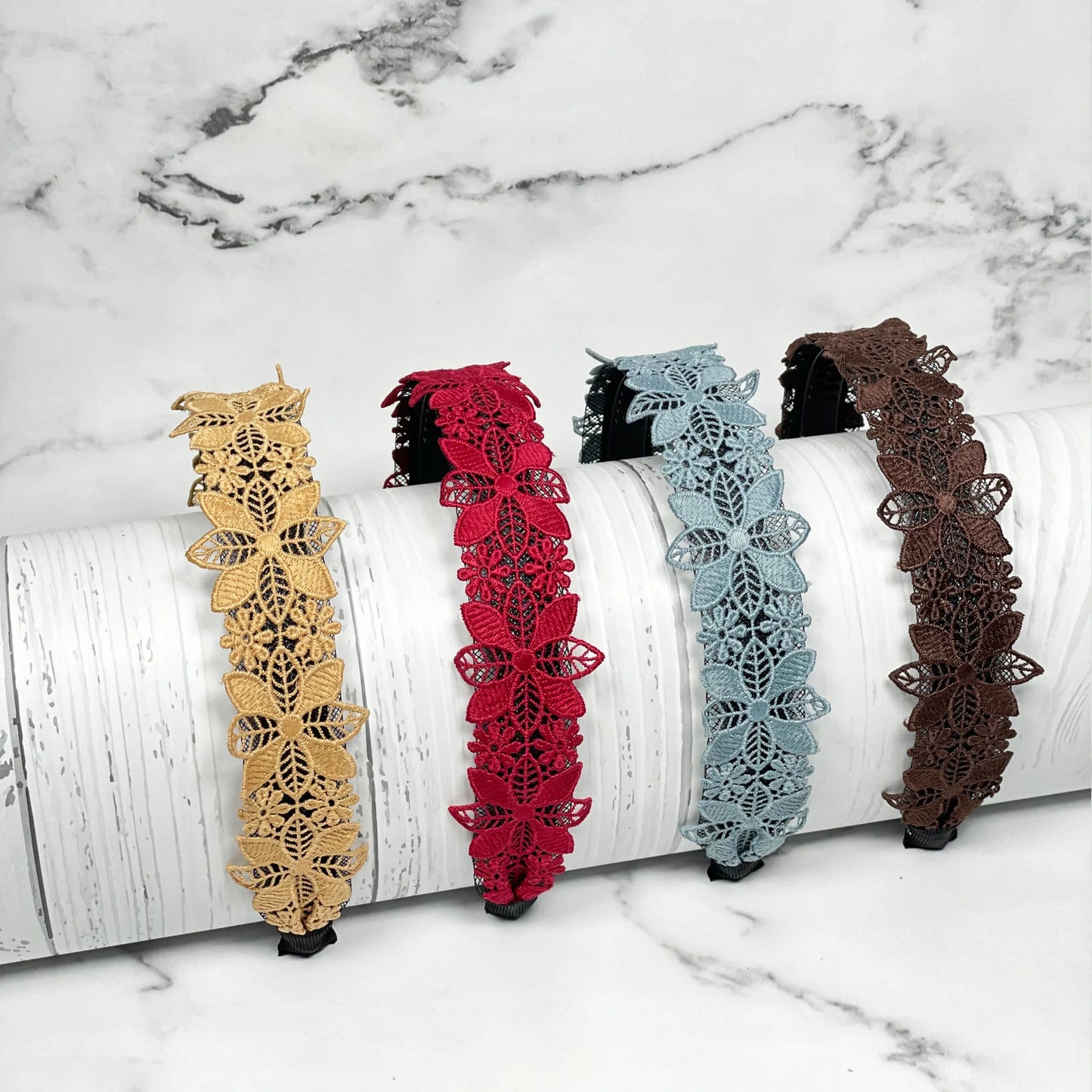 Medium broad colored hair bands in beige red blue and brown with butterfly lace design