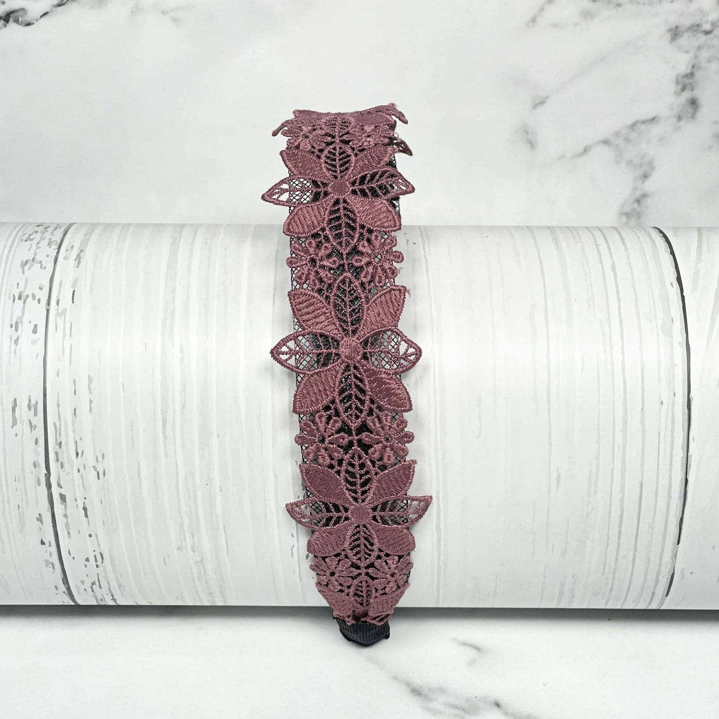 Medium broad colored hair bands with intricate floral lace design in dusty pink color