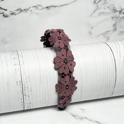 Medium Broad Lacy Floral Hairbands in dusty rose with intricate flower lace design on white background