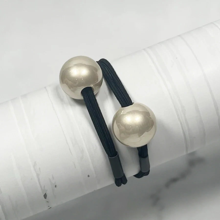 Black elastic hair ties with large white pearl bead hair ties for stylish hair accessories