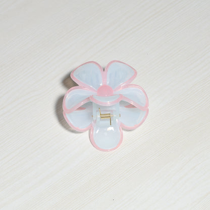 Pearl Finish Single Flower Clutch hair accessory with pink and white petals on light background