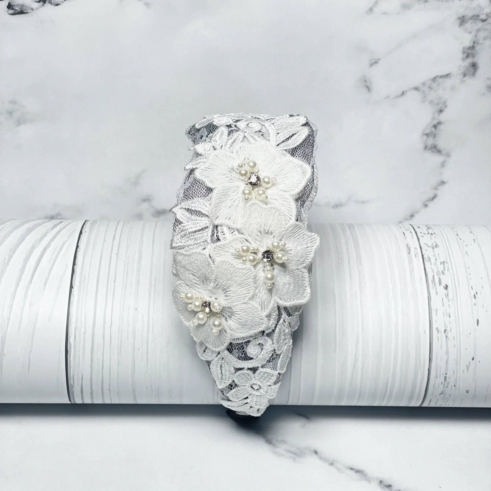Three flower broad hairbands with white lace and pearl accents for elegant styling