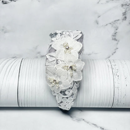 Three flower broad hairbands with white lace and pearl accents for elegant styling