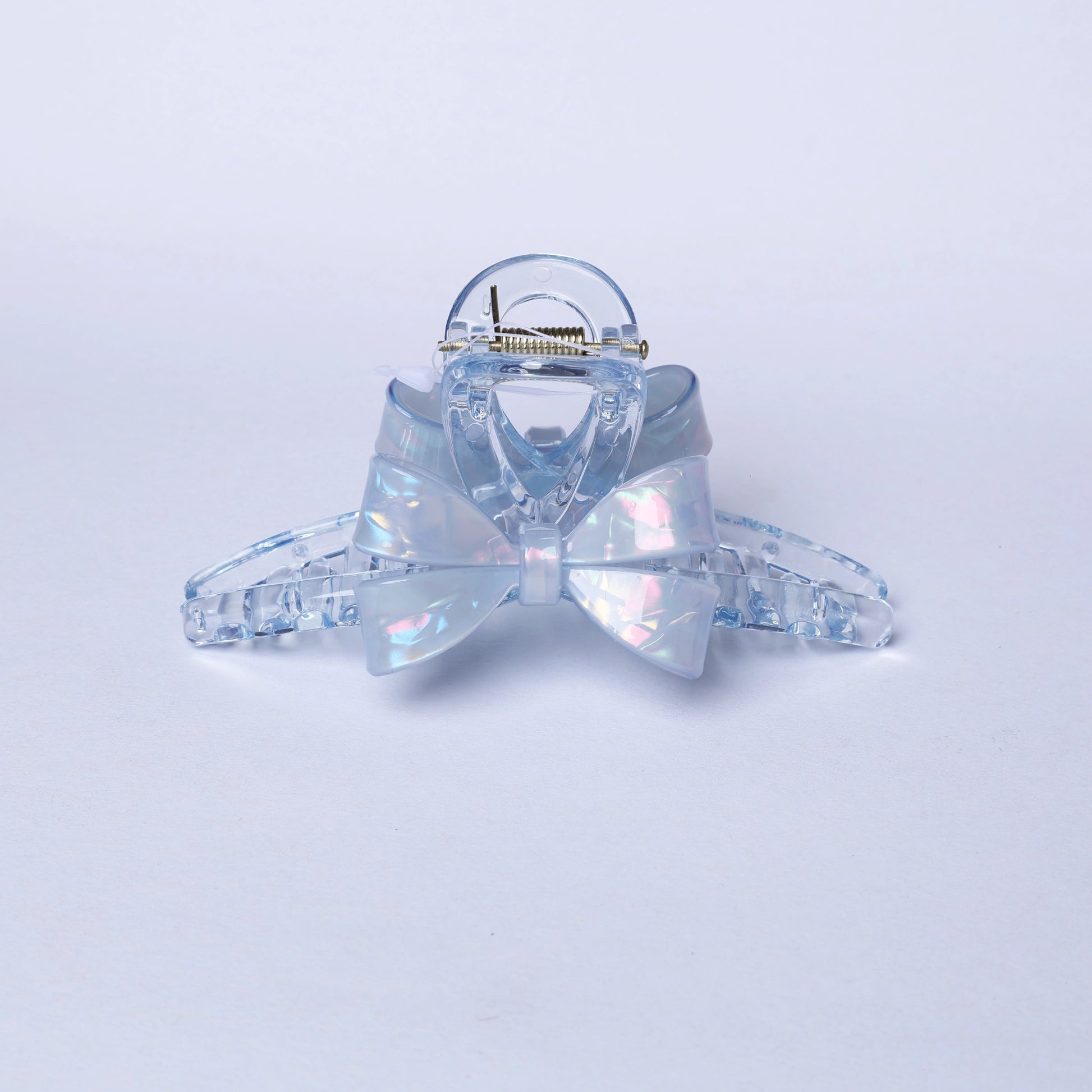 Clear iridescent bow hair clutches with a shiny bow design for stylish hair accessories