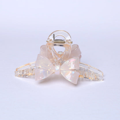 Iridescent bow hair clutches with transparent plastic design for stylish hair accessories