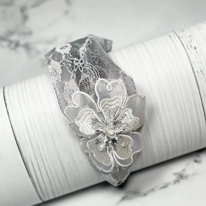 Gray lacy embellished hairbands for women with floral design and pearl detail accessory