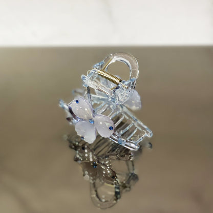 Clear pearl studded flower hair clutch with blue accents and spring clasp from mydevelopmentstor